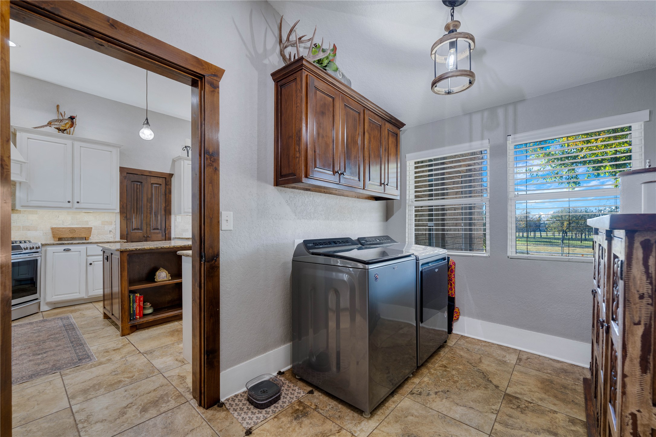 8323 East State Highway 29 Georgetown, TX 78626 - Photo 30 of 39 a kitchen with a refrigerator a stove and a sink