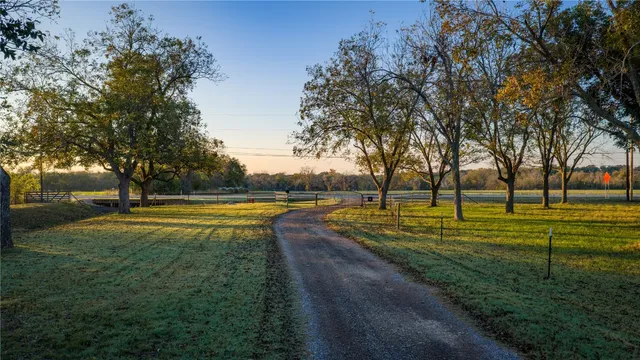 a aerial view of a house with a lake view