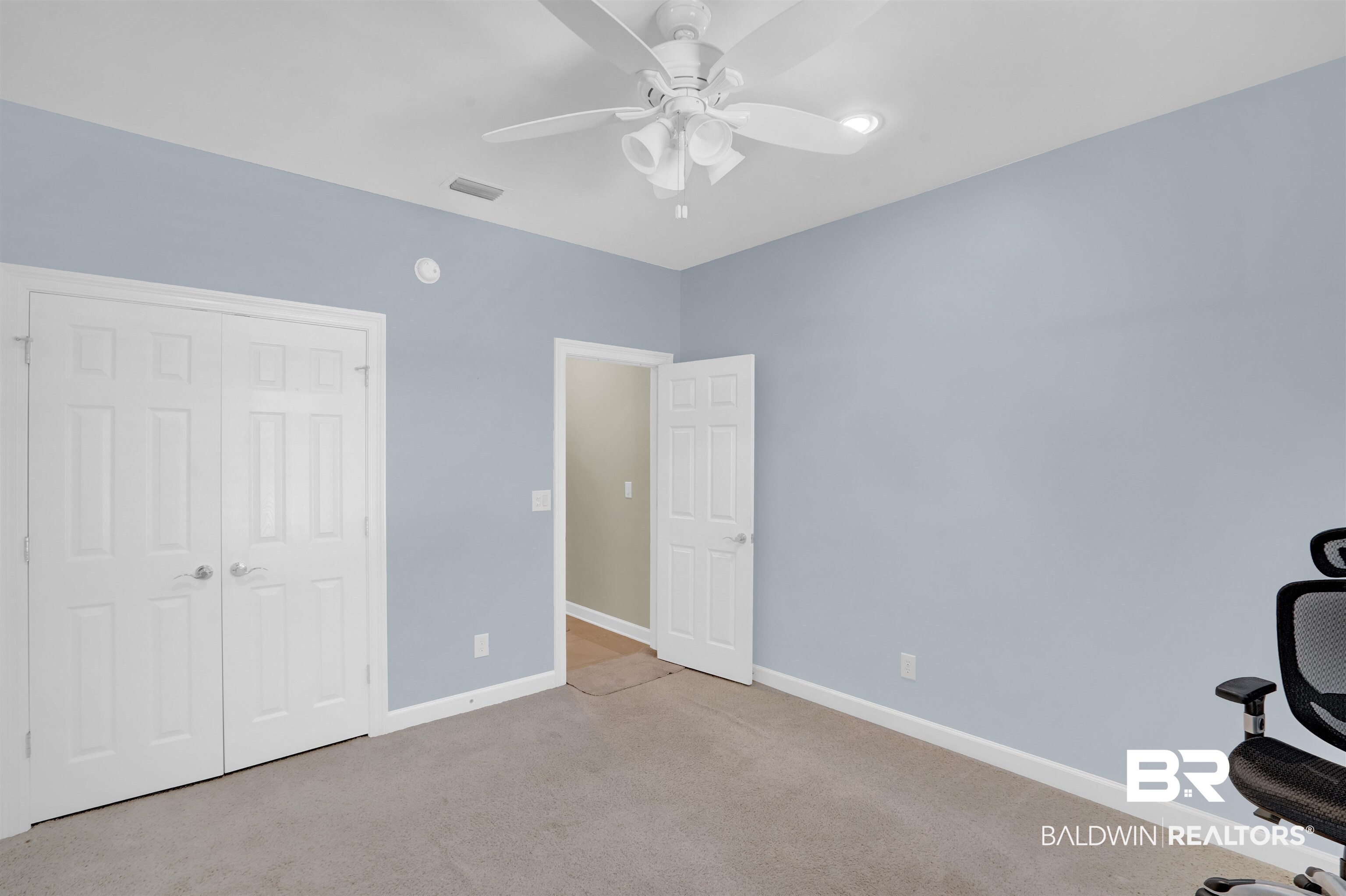10951 Driver Court Fairhope, AL 36532 - Photo 36 of 46 Unfurnished bedroom with ceiling fan, a closet, and light colored carpet