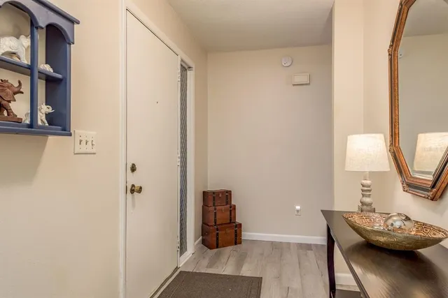 a view of a livingroom with furniture and wooden floor