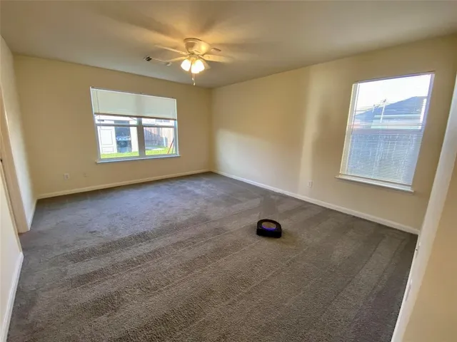 an empty room with windows