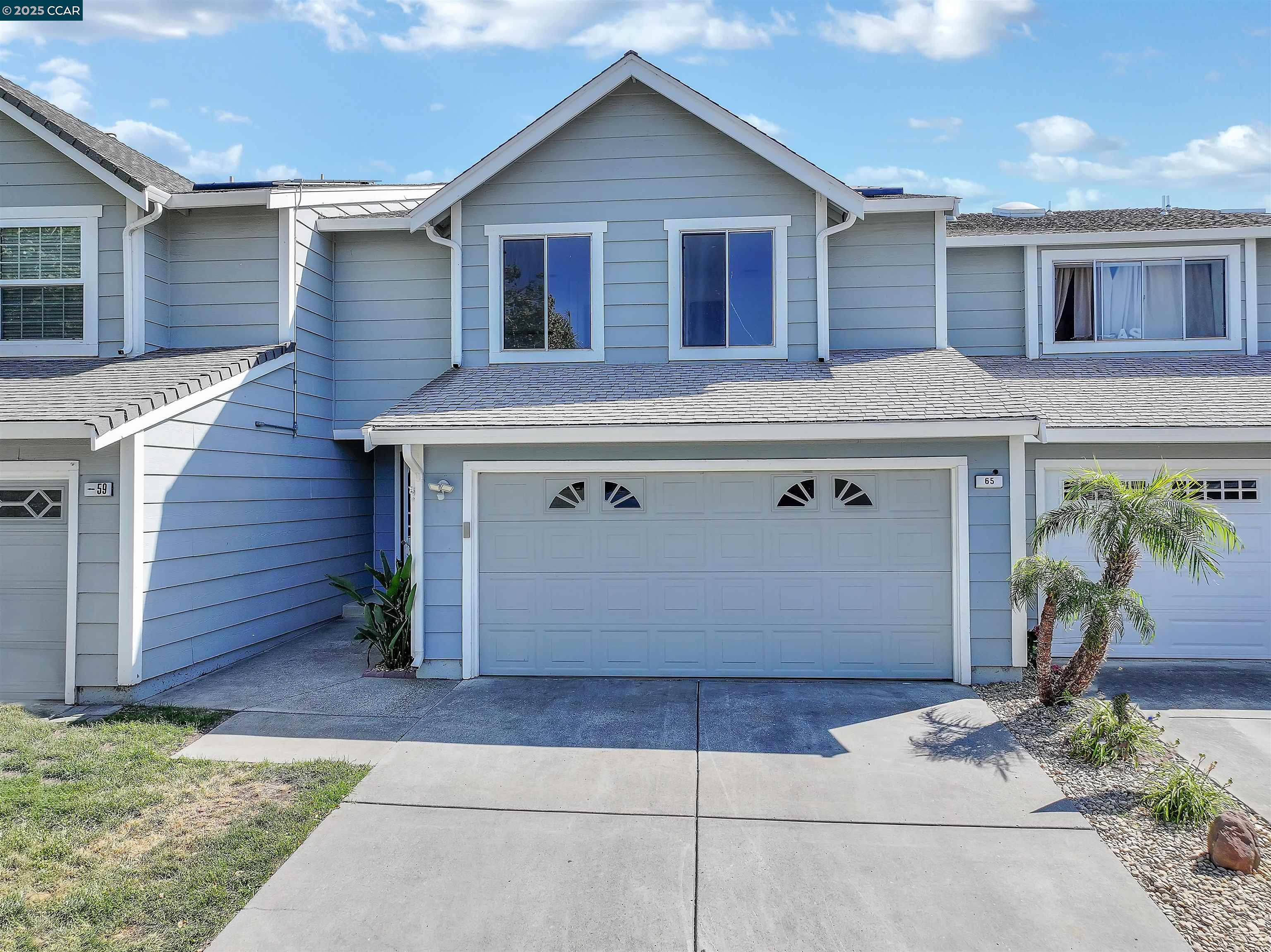 65 Edgewater Place Pittsburg, CA 94565 - Photo 1 of 31 a front view of house with yard