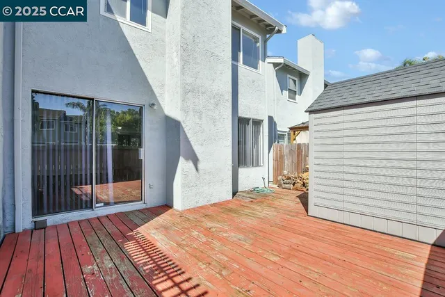 a balcony with a rug