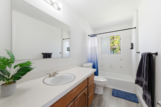 2632 North 140 West Sunset, UT 84015 - Photo 6 of 12 Full bathroom featuring vanity and shower / bath combination with curtain