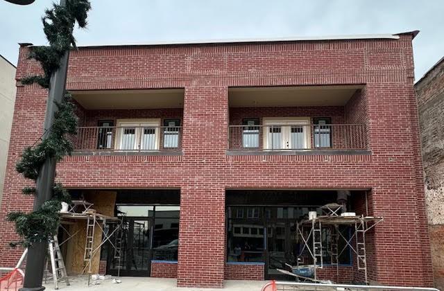 a front view of a building with entryway