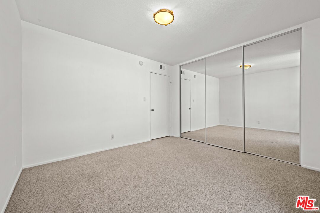 1312 South Saltair Avenue, Unit 215 Los Angeles, CA 90025 - Photo 19 of 31 a view of an empty room