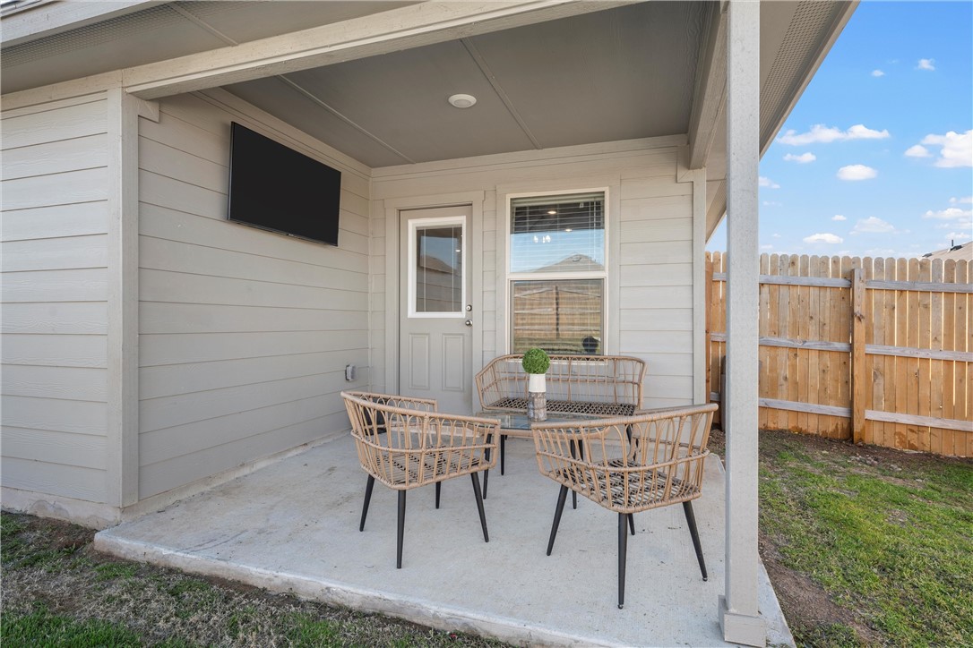 7009 Llano Drive China Spring, TX 76633 - Photo 20 of 25 a patio with table and chairs and potted plants