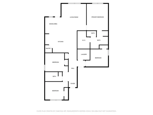 a picture of a bench in front of a gate