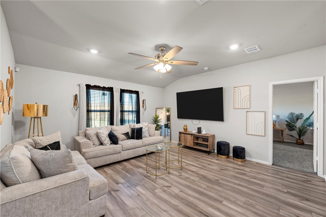 7009 Llano Drive China Spring, TX 76633 - Photo 4 of 25 a living room with furniture and a flat screen tv