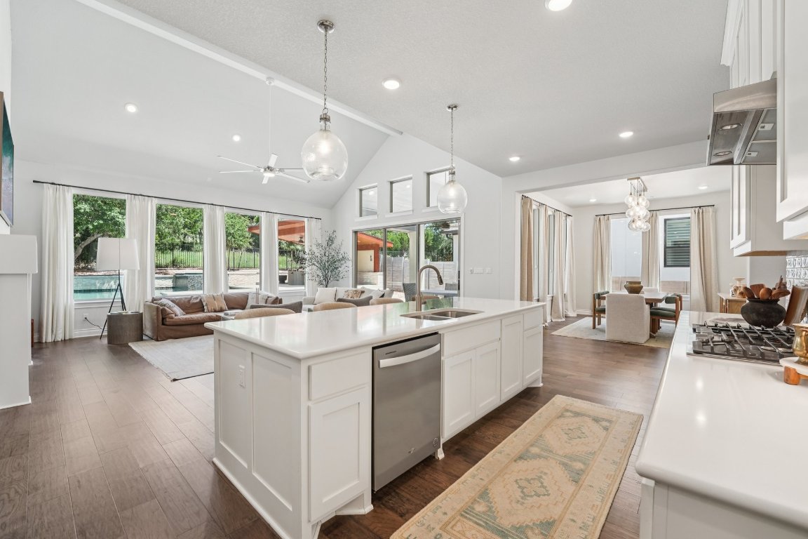 120 Hollytree Court Georgetown, TX 78628 - Photo 12 of 40 a large white kitchen with a large window and furniture