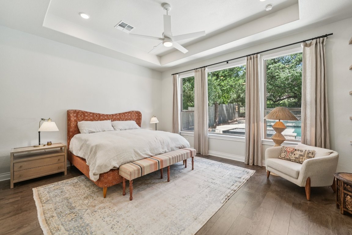 120 Hollytree Court Georgetown, TX 78628 - Photo 17 of 40 a bedroom with a bed and a couch