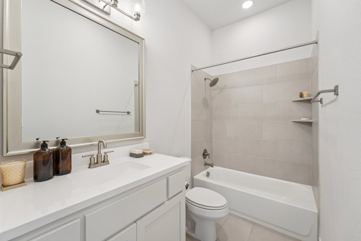 120 Hollytree Court Georgetown, TX 78628 - Photo 23 of 40 a bathroom with a sink a toilet and shower