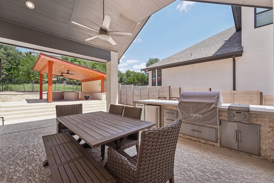120 Hollytree Court Georgetown, TX 78628 - Photo 30 of 40 a view of a patio with table and chairs