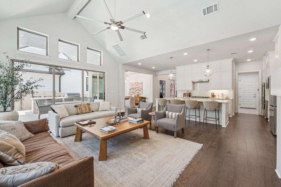 120 Hollytree Court Georgetown, TX 78628 - Photo 10 of 40 a living room with furniture kitchen view and a wooden floor