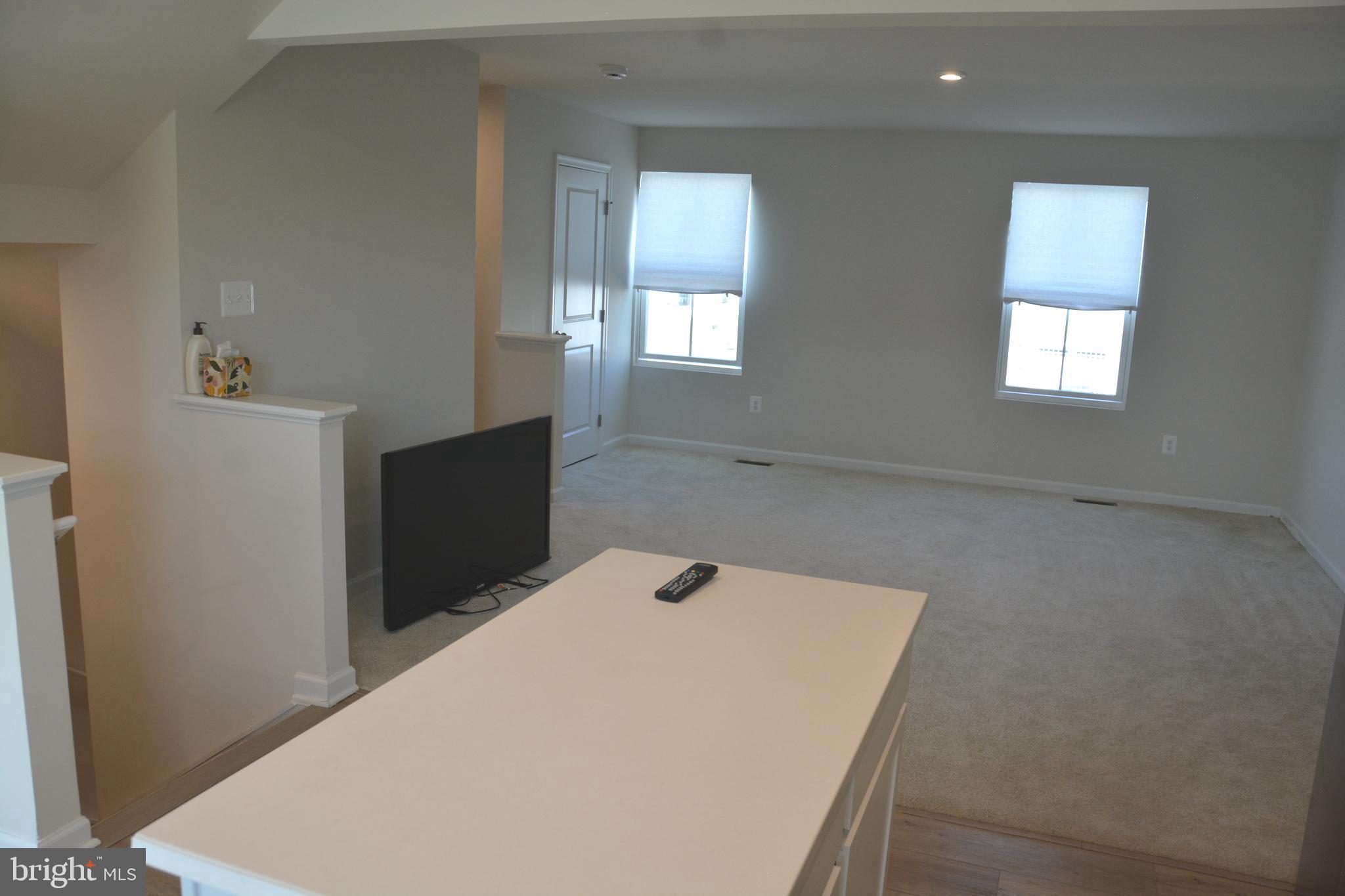 14 Tadpole Landing Road Inwood, WV 25428 - Photo 6 of 26 Open space into Kitchen/Livingroom/Dining area