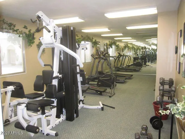 a view of a room with gym equipment