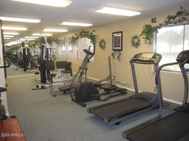 a view of a swimming pool and a yard