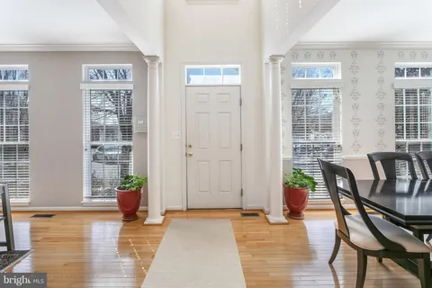 a view of a livingroom with furniture and front door