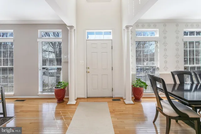 a view of a livingroom with furniture and front door