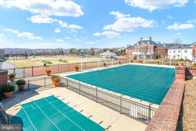 a view of a terrace with outdoor seating and city view