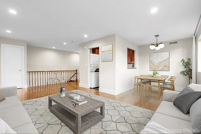 a living room with furniture and a table