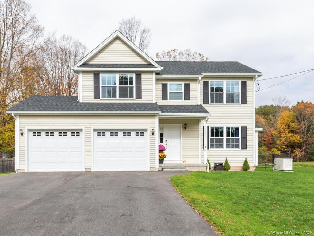 a house view with a garden space