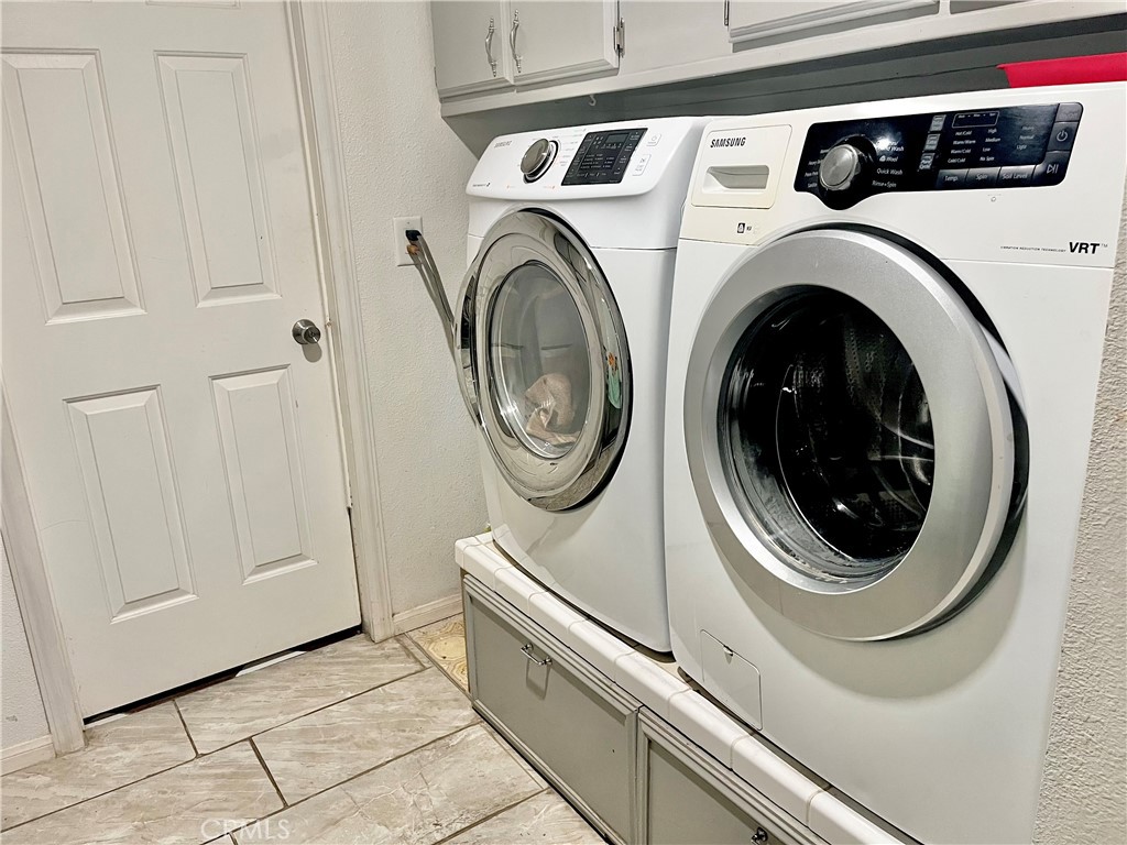 30865 Allen Avenue Homeland, CA 92548 - Photo 10 of 18 a utility room with dryer and washer