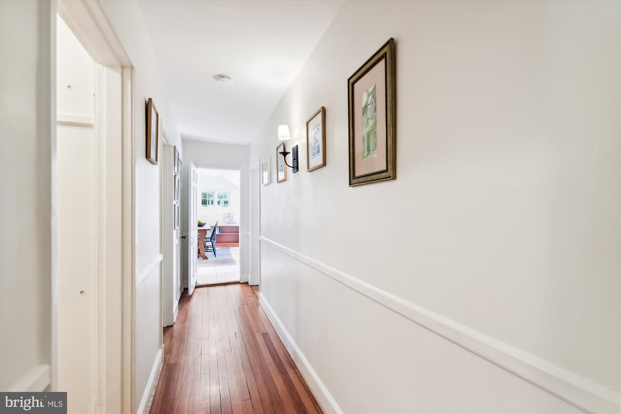 201 Cedarcroft Road Baltimore, MD 21212 - Photo 15 of 88 Hallway with sconce & chair rail on main level