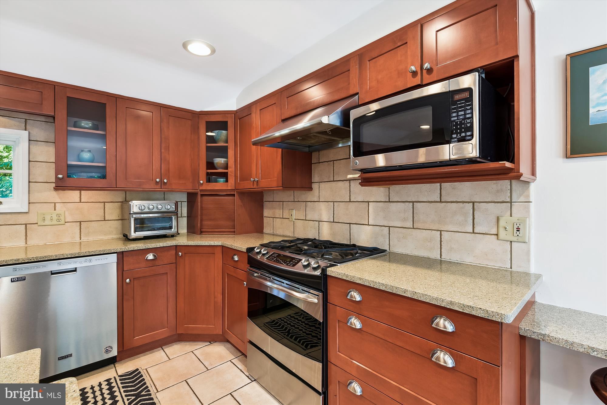 201 Cedarcroft Road Baltimore, MD 21212 - Photo 18 of 88 Kitchen with gas range, stainless steel appliances
