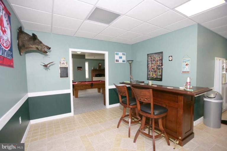 8500 Churchill Downs Road Gaithersburg, MD 20882 - Photo 10 of 30 Pub Room with Built-in Refrigerator