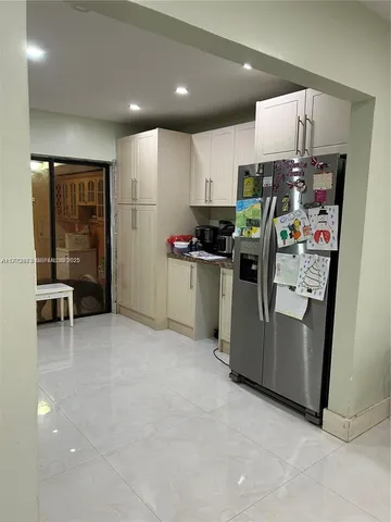 a view of a workspace with furniture