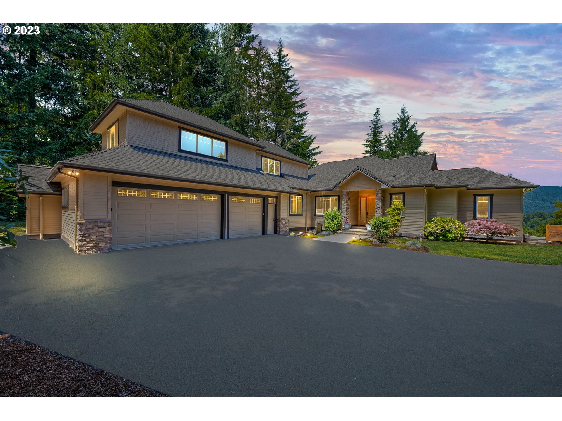 a view of house with outdoor space and parking