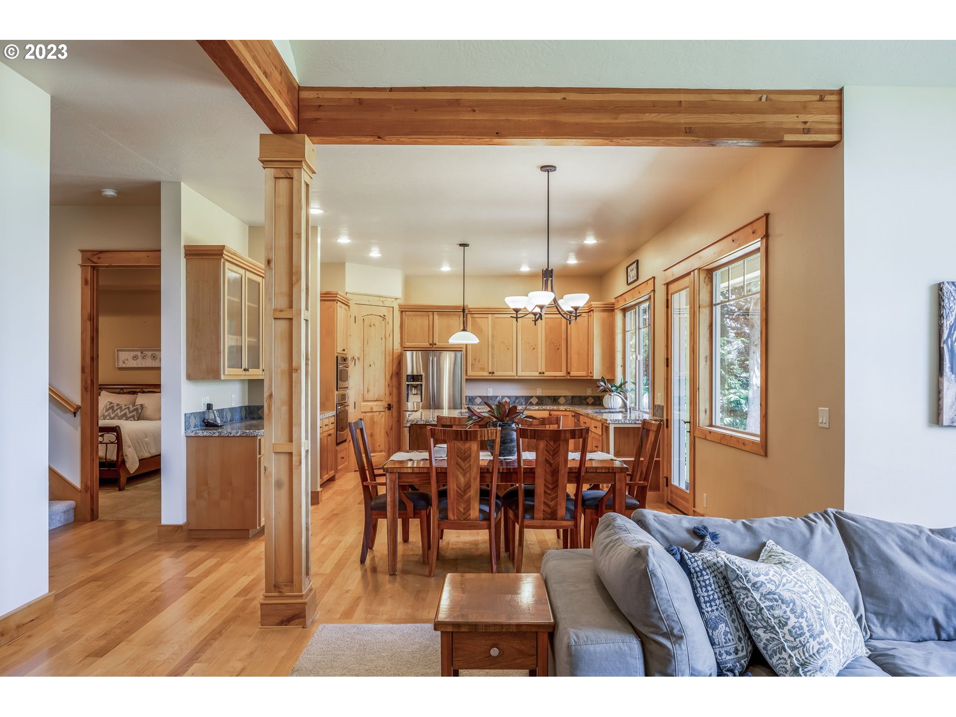 40091 Deerhorn Road Springfield, OR 97478 - Photo 13 of 46 a view of a livingroom with furniture window and wooden floor