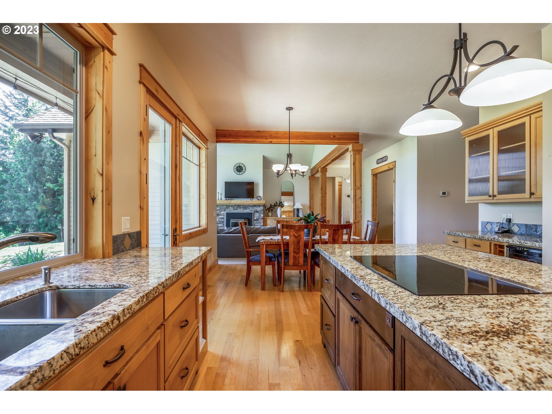 40091 Deerhorn Road Springfield, OR 97478 - Photo 20 of 46 a kitchen with wooden cabinets and sink