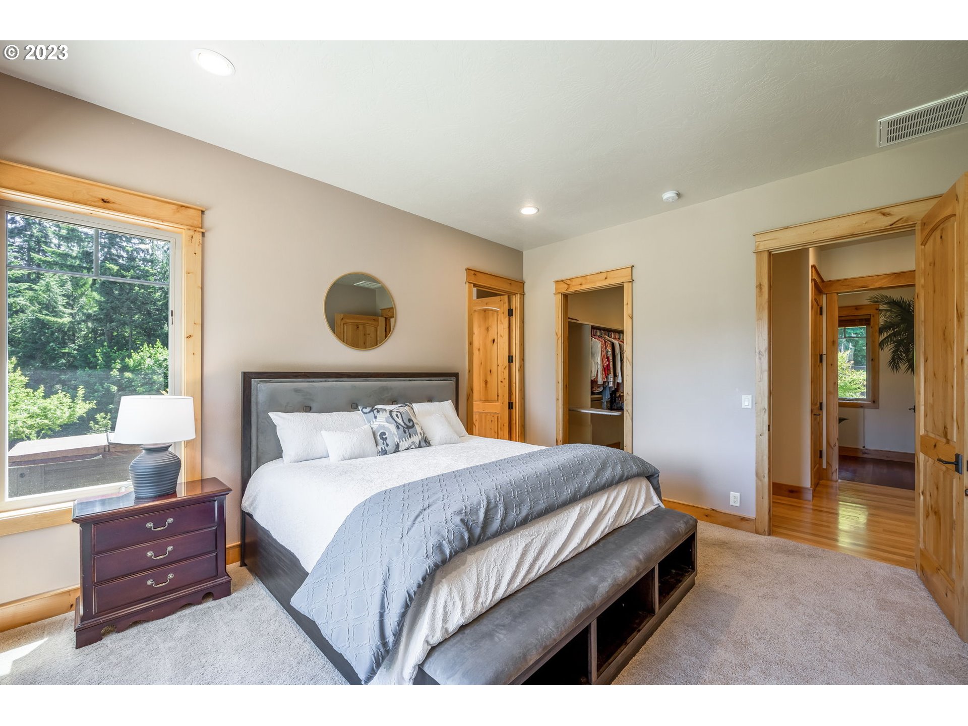 40091 Deerhorn Road Springfield, OR 97478 - Photo 26 of 46 a bedroom with a bed and a large window