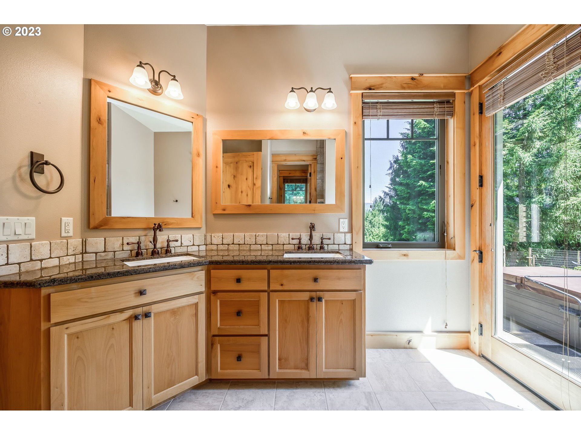 40091 Deerhorn Road Springfield, OR 97478 - Photo 29 of 46 a bathroom with a granite countertop sink mirror and a bathtub