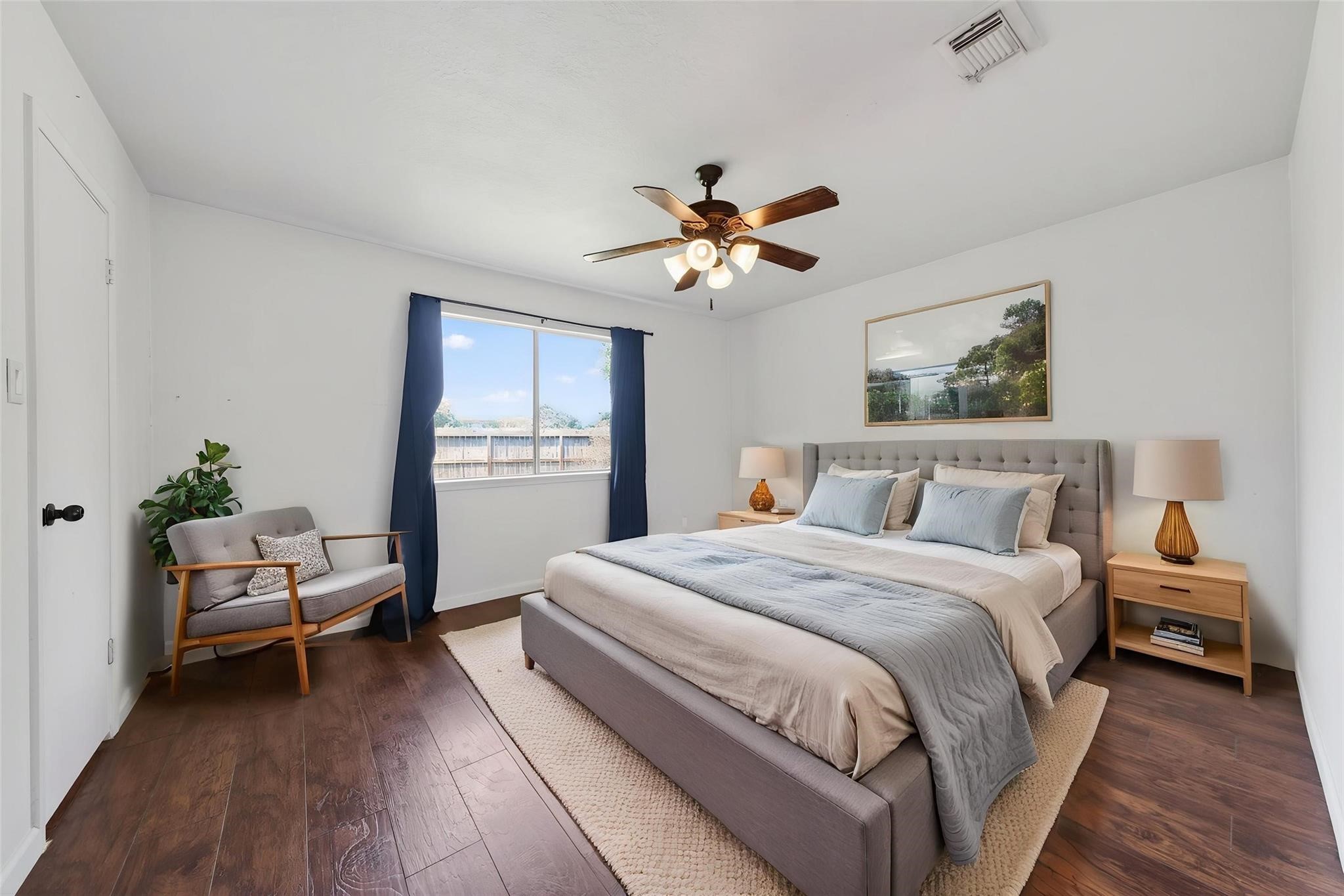 17002 Dew Drop Lane Houston, TX 77095 - Photo 21 of 24 a spacious bedroom with a bed and a window