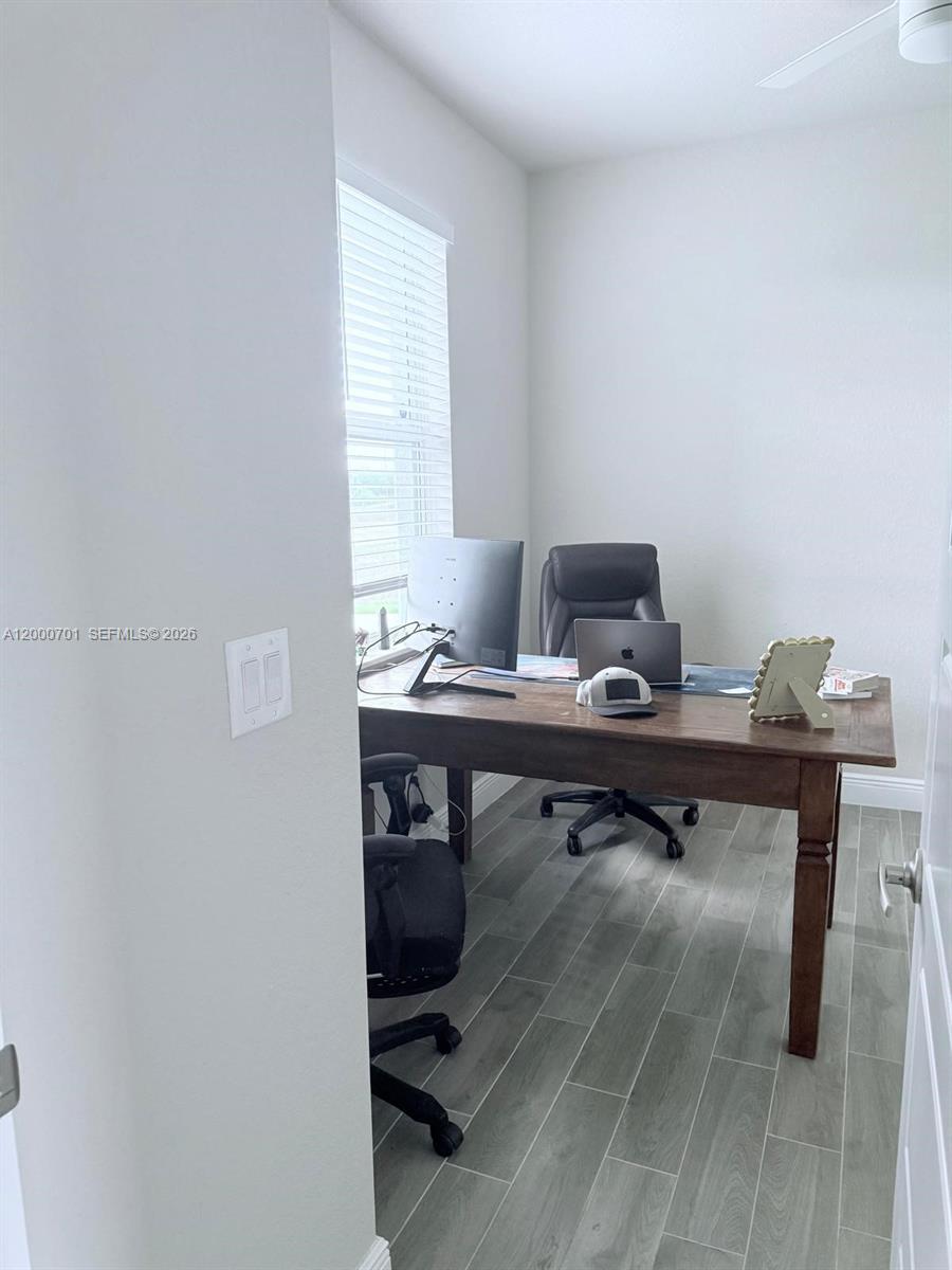 368 Neighborly Road LaBelle, FL 33935 - Photo 12 of 23 a view of a workspace with furniture