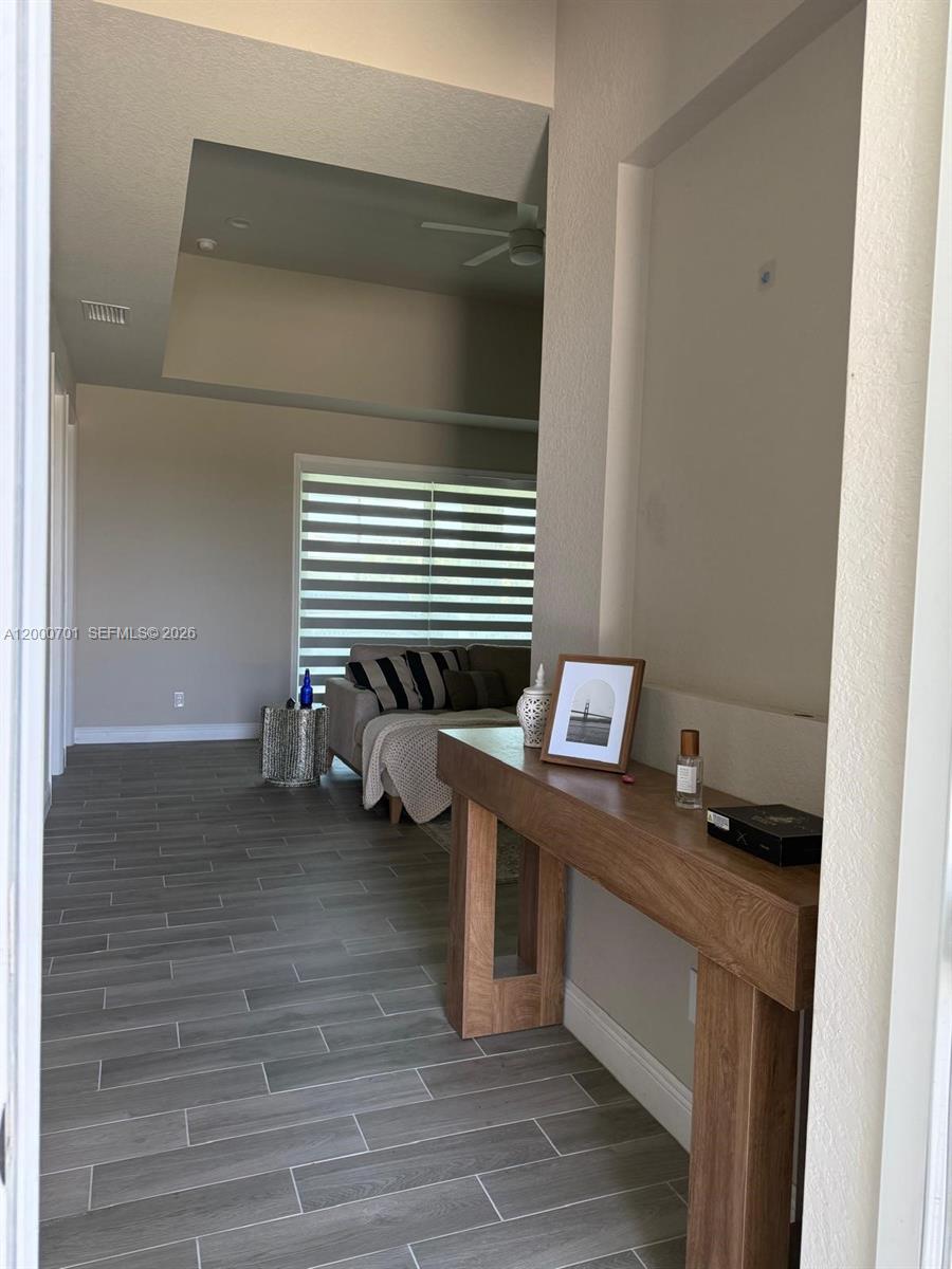 368 Neighborly Road LaBelle, FL 33935 - Photo 2 of 23 a view of a hardwood floor and staircase