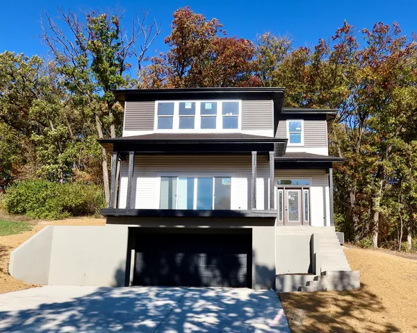 a view of a house with a balcony