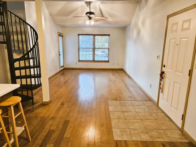 a bathroom with a sink a toilet a mirror and vanity