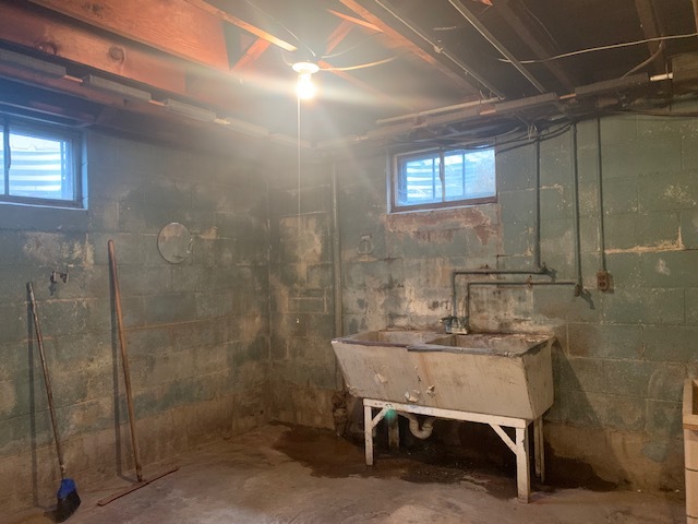 321 East Washington Street Ottawa, IL 61350 - Photo 16 of 20 a bathroom with a sink shower and a mirror