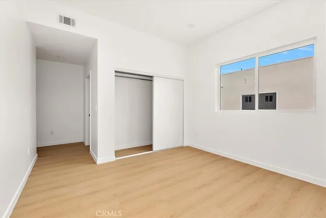 a view of a room that has a bathroom in it