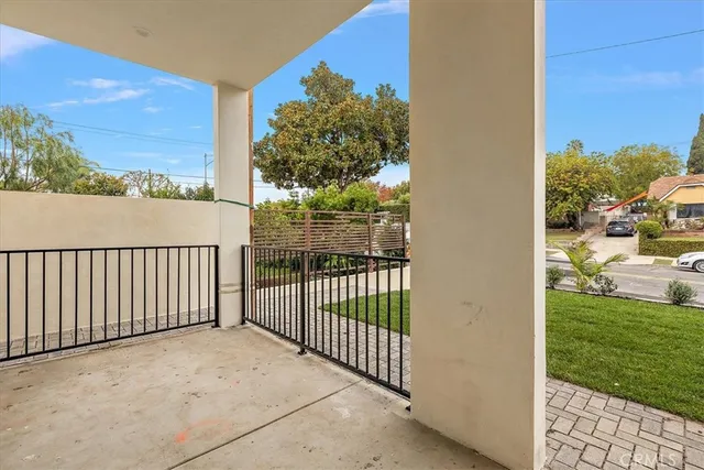 a view of a kitchen with microwave and cabinets