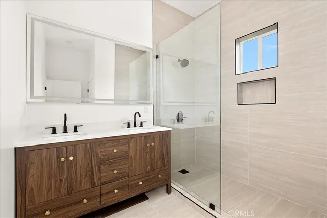 a living room with furniture and white walls