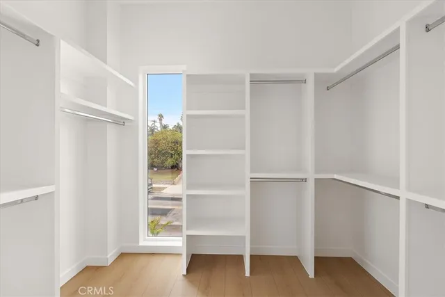 a view of an empty walk in closet