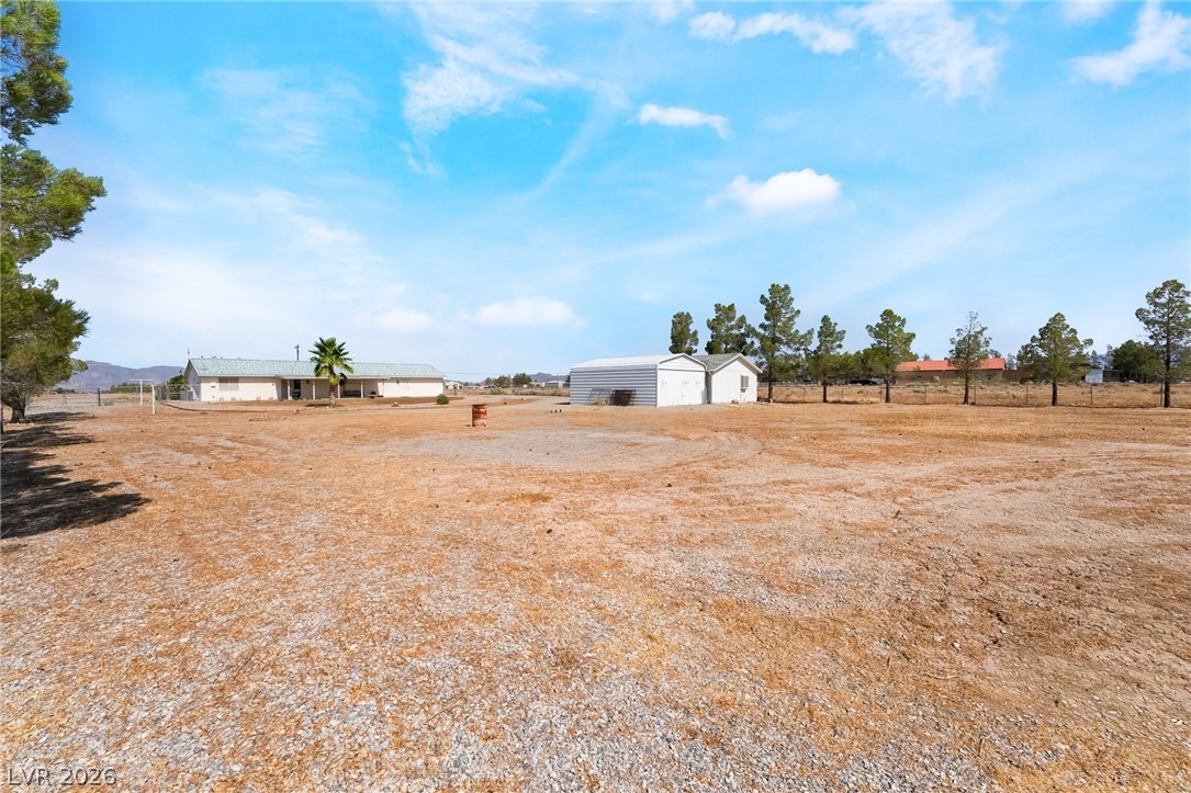 3631 South Blagg Road Pahrump, NV 89048 - Photo 37 of 47 A sprawling lot offers ample space for expansion with additional outbuildings and potential for personalized landscaping.