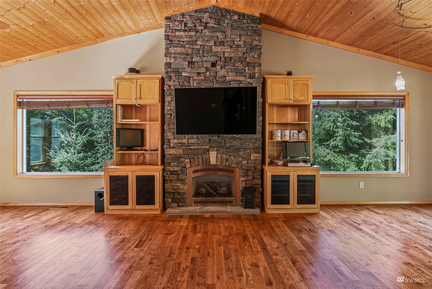 241 Puma Road Longview, WA 98632 - Photo 6 of 24 a living room with fireplace furniture and a flat screen tv