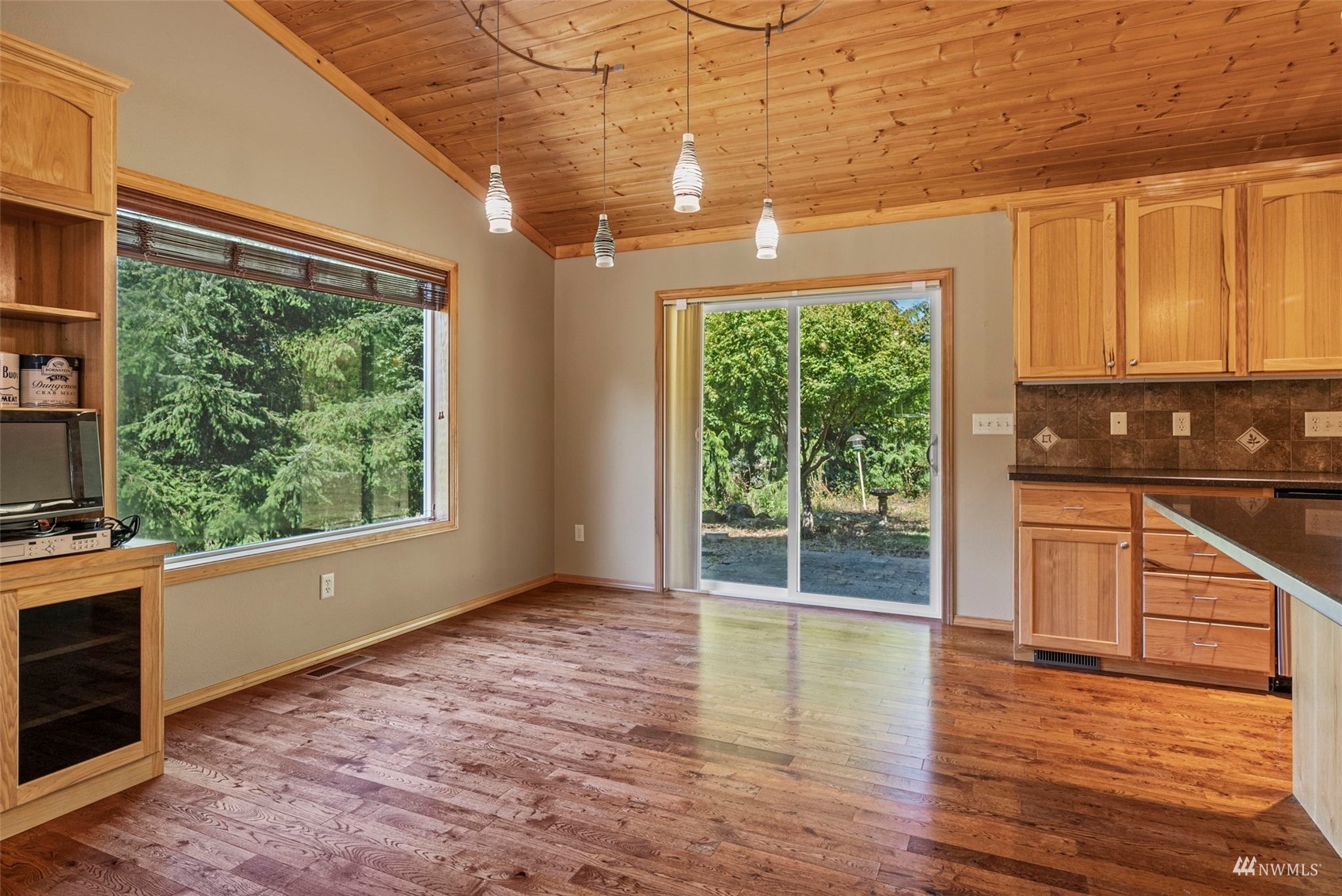 241 Puma Road Longview, WA 98632 - Photo 7 of 24 a view of a kitchen with wooden floor and a window