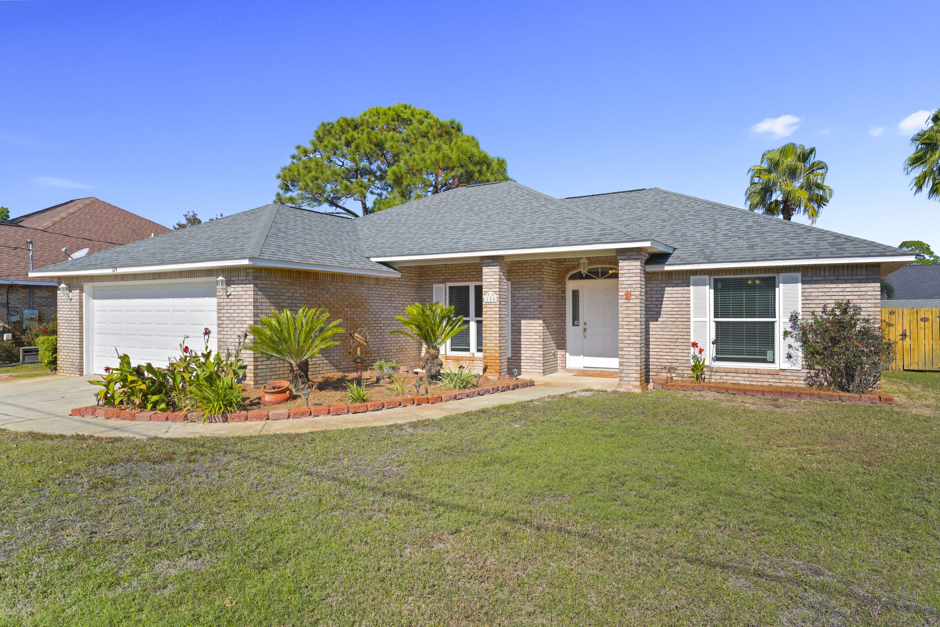 front view of a house with a yard